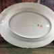 Very large oval Christmas dish in Limoges porcelain white and gold 43cm