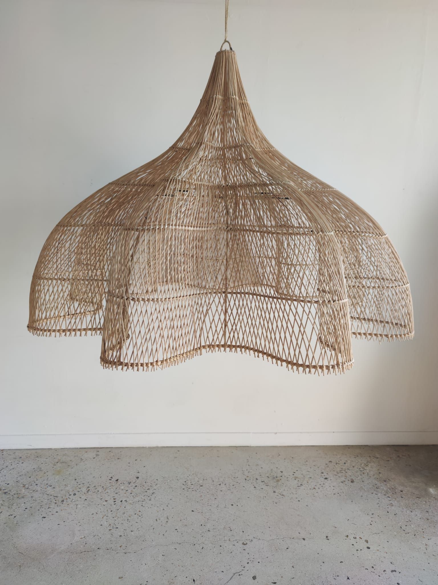 Huge rattan suspension in the shape of a corolla H:1m; D: 1m50