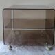 Table de chevet basse plexiglas fumé Michel Dumas pour Roche Bobois roulettes vintage