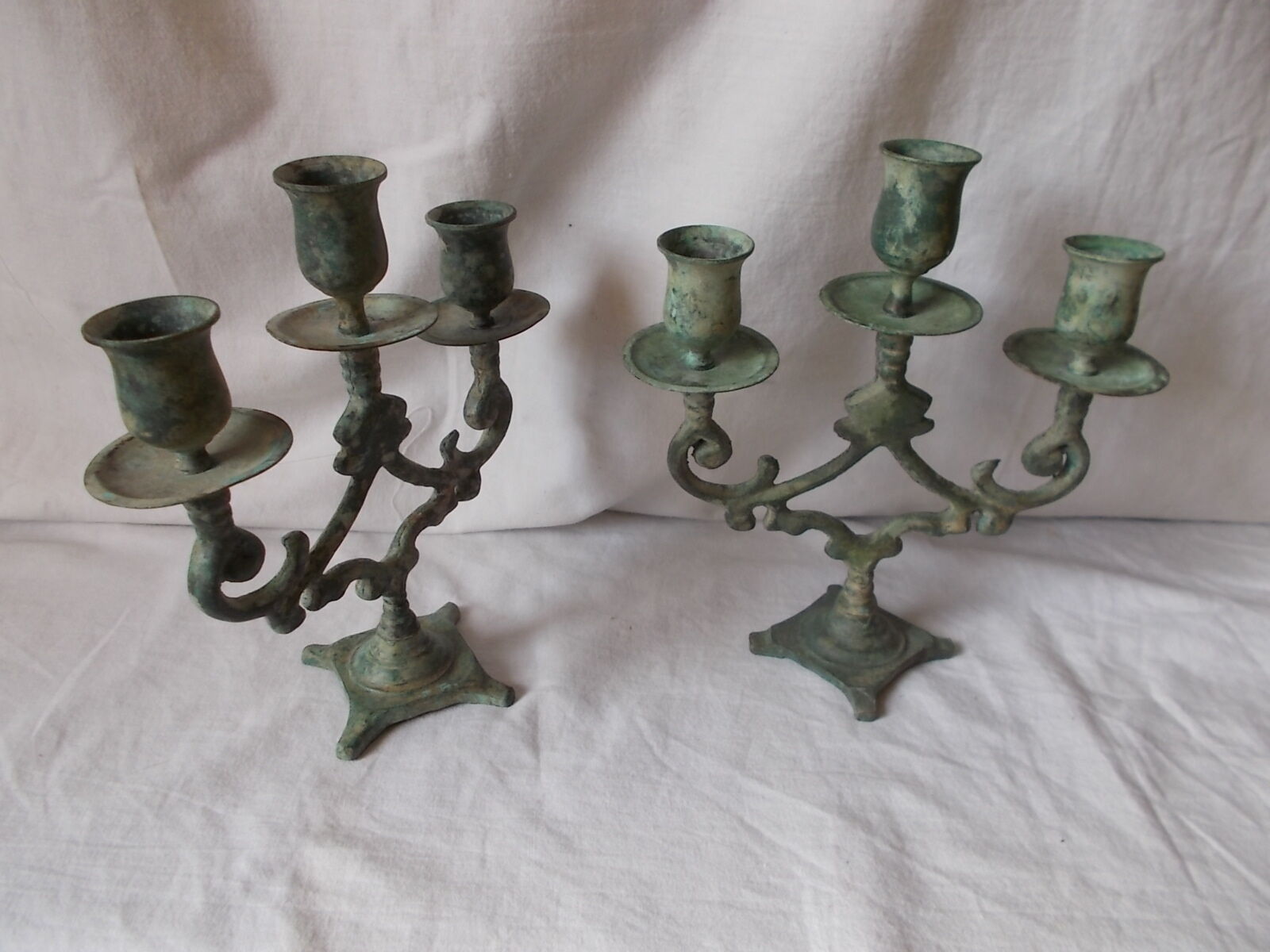 Pair of metal candlesticks patina green grey