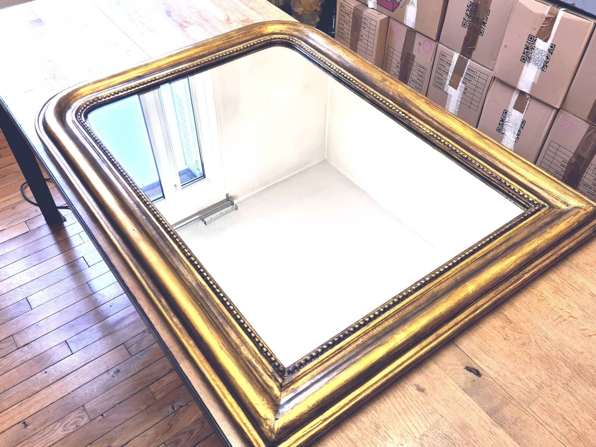 Old large Louis Phillipe mirror, gilded with gold leaf - Emilien"