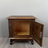 Pair of carved wooden bedside tables, early 20th century