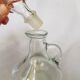Bouteille d'huile en verre vintage