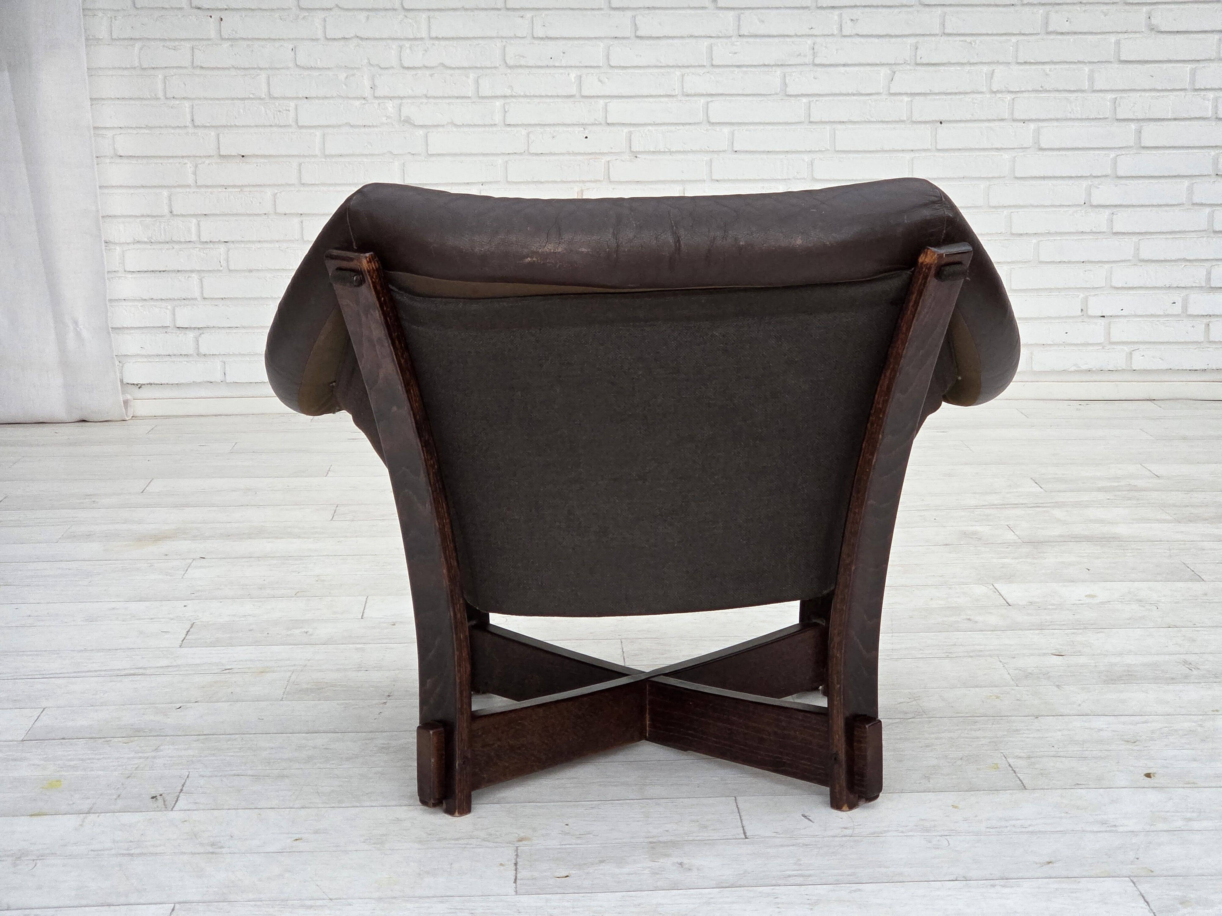 1970s, Scandinavian lounge chair, furniture leather, oak wood.