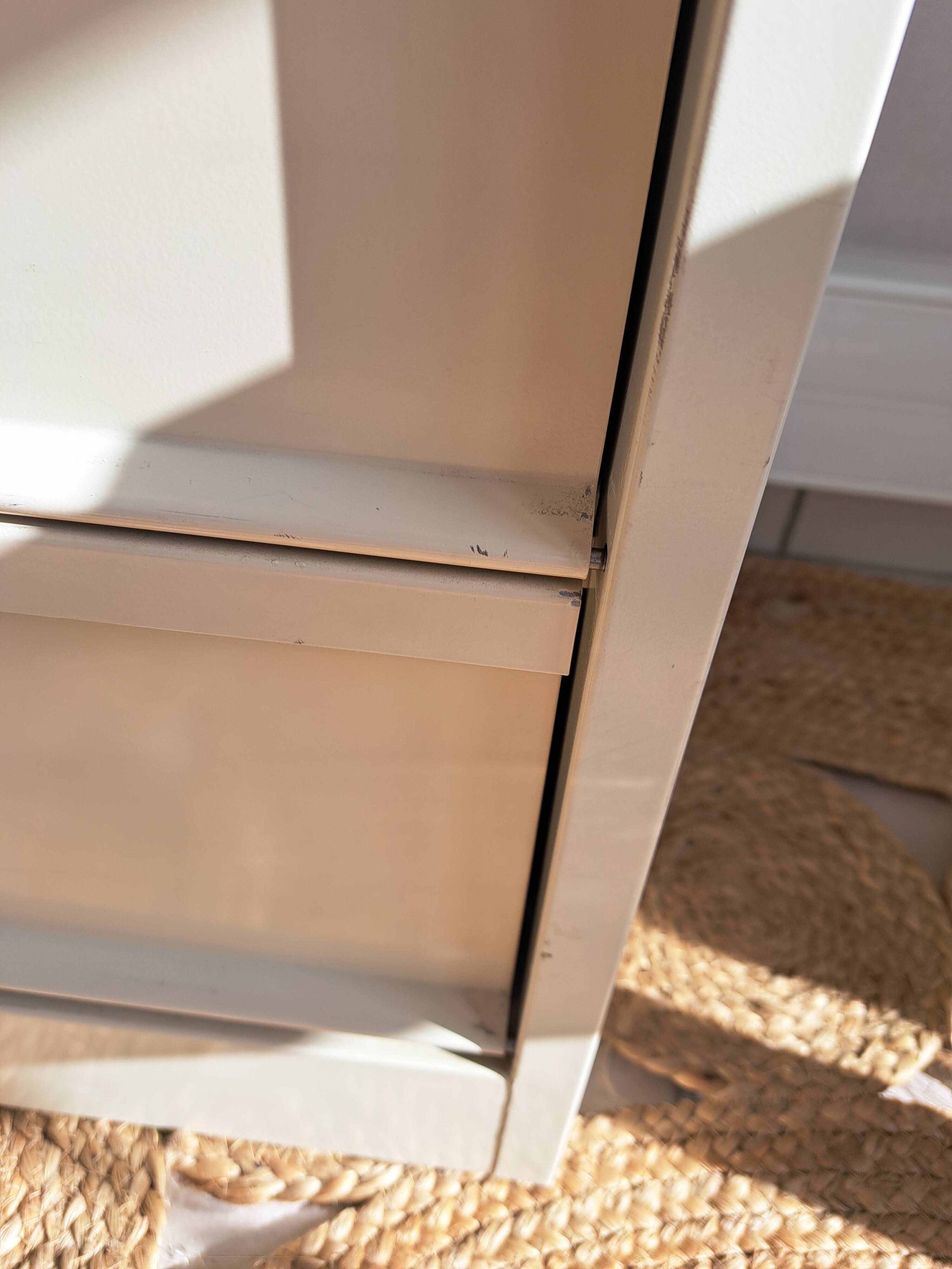 Vintage metal clamshell cabinet