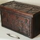 Coffre en bois sculpté bas reliefs artisanal XXème