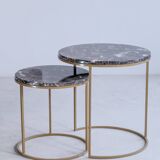 Trundle tables in imperial brown marble.