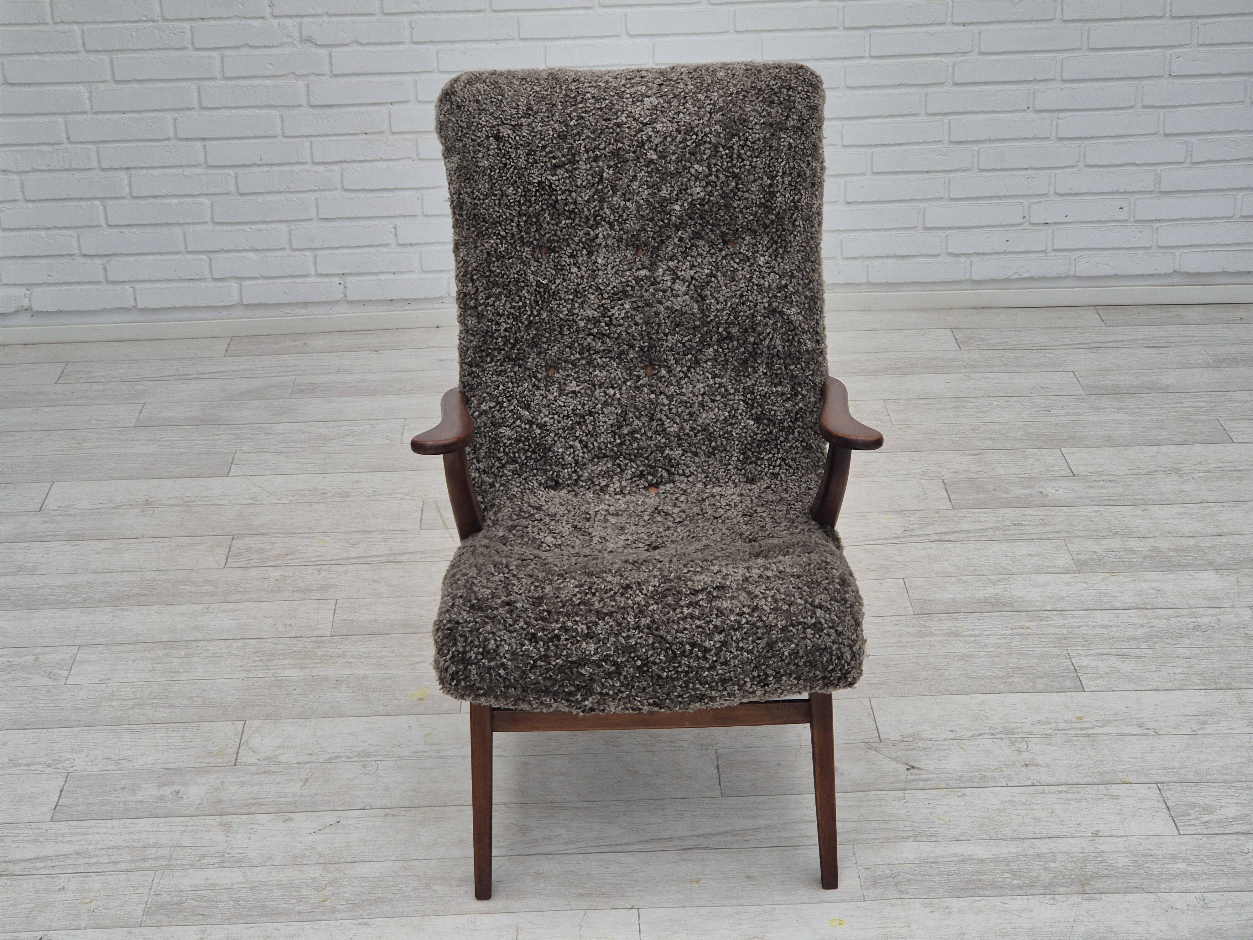 60s, Danish design, refurbished armchair, genuine sheepskin "Wellington".