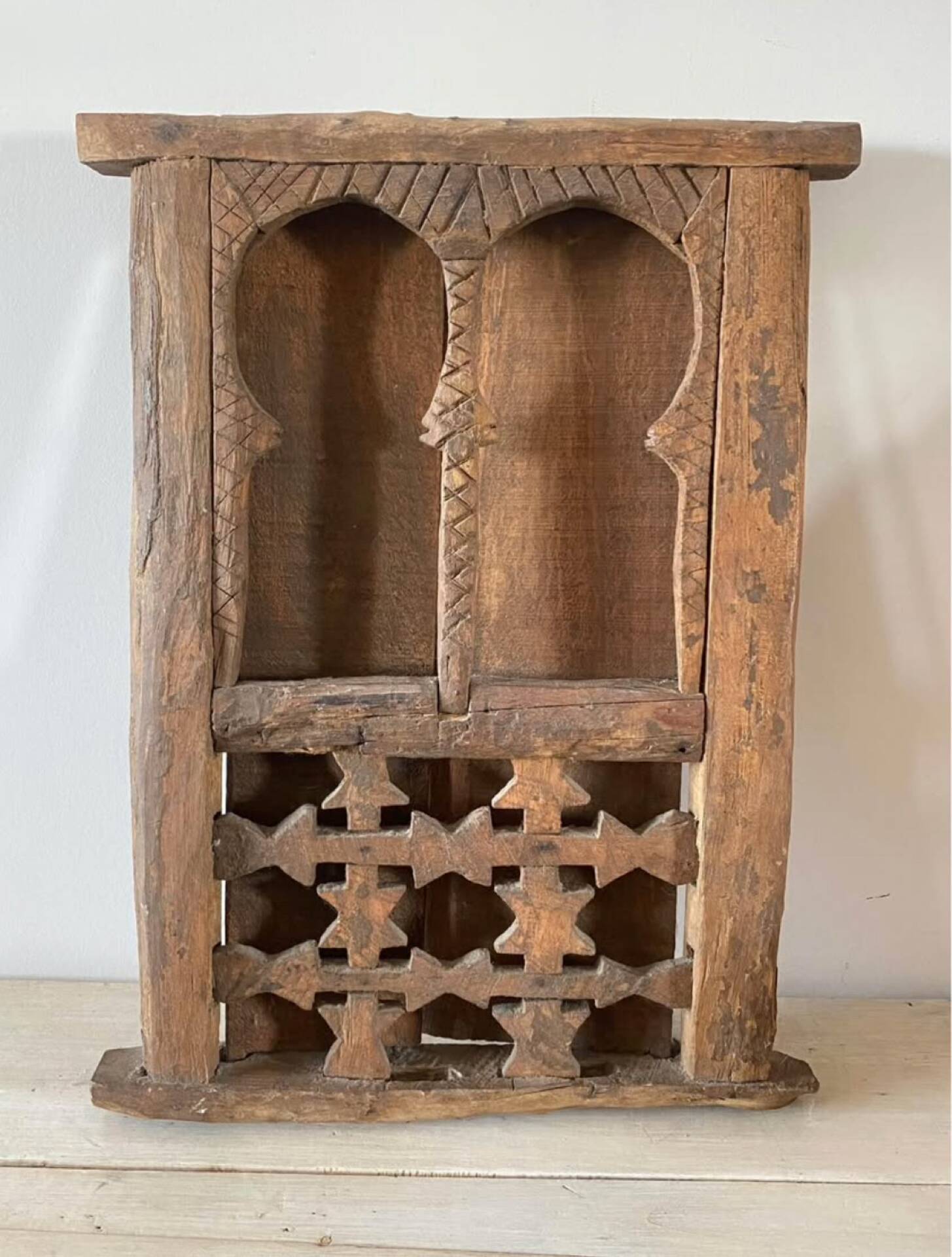 Window of an ancient Kasbah in carved solid wood – Berber craftsmanship