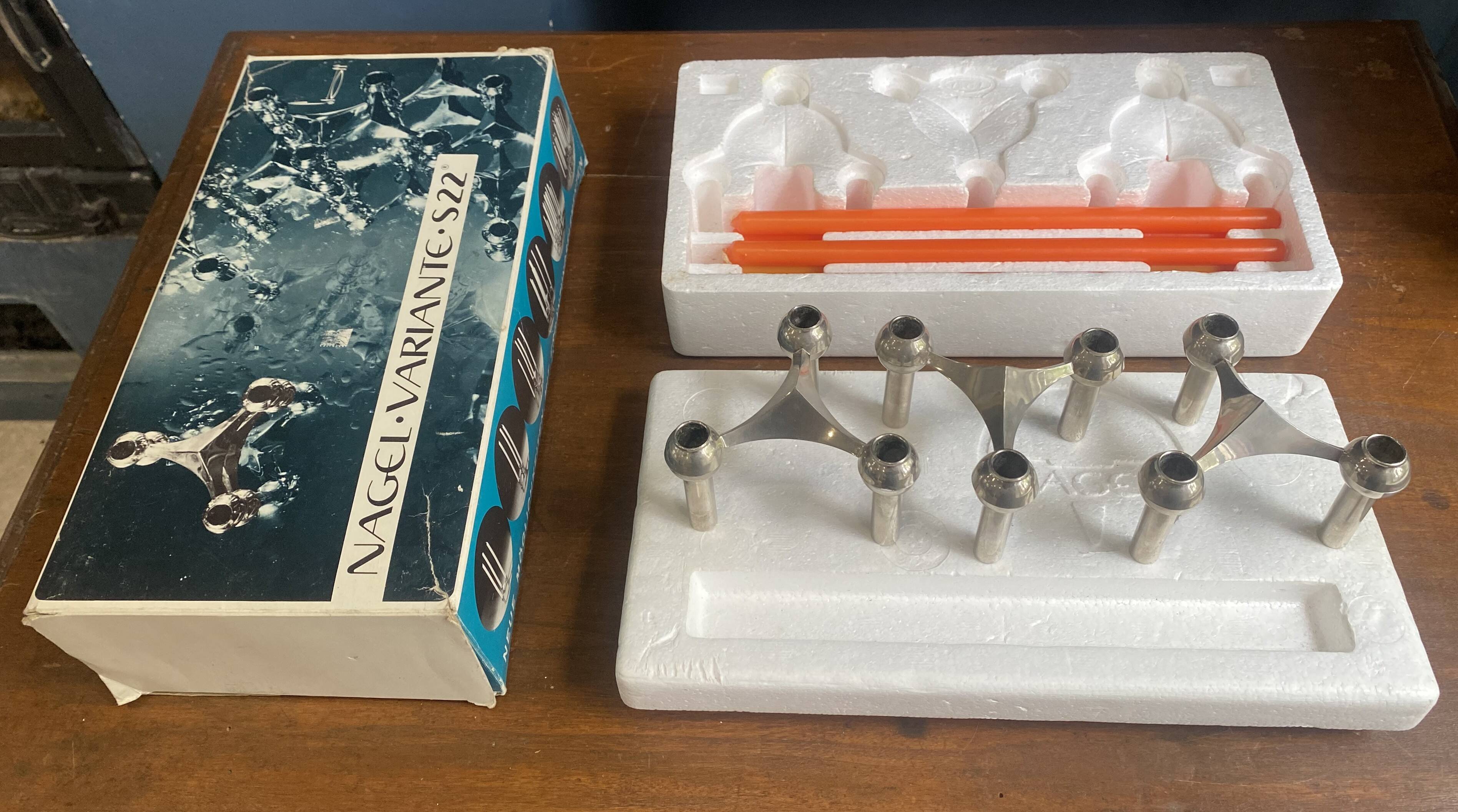 Set of 3 S22 candle holders and 9 vintage 1970 NAGEL modular candles in box.