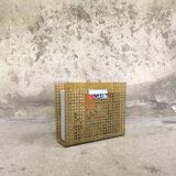 Vintage magazine rack in plexiglass and cane.