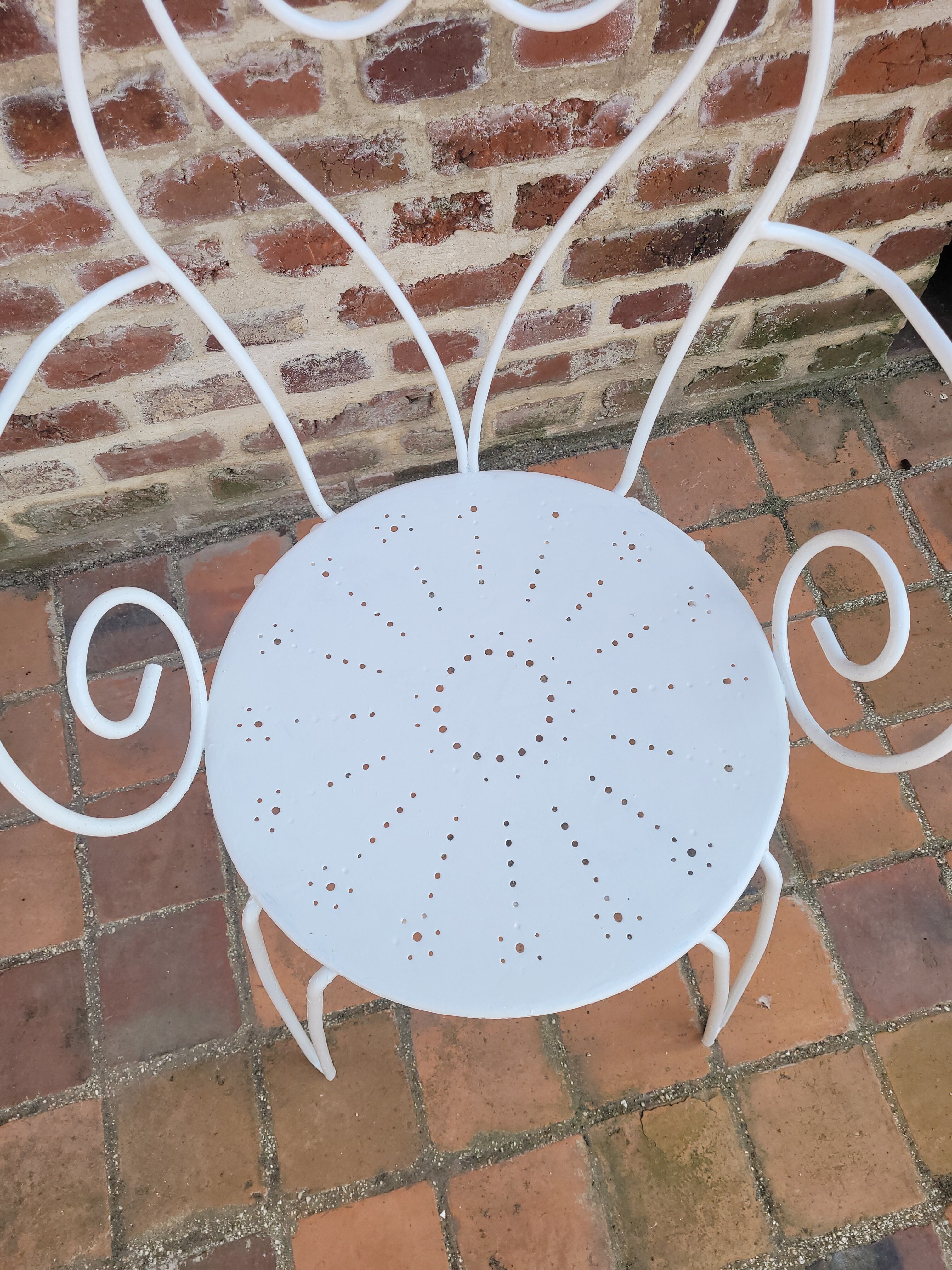 Wrought iron garden armchair