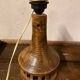 Vintage ceramic table lamp with integrated light base.