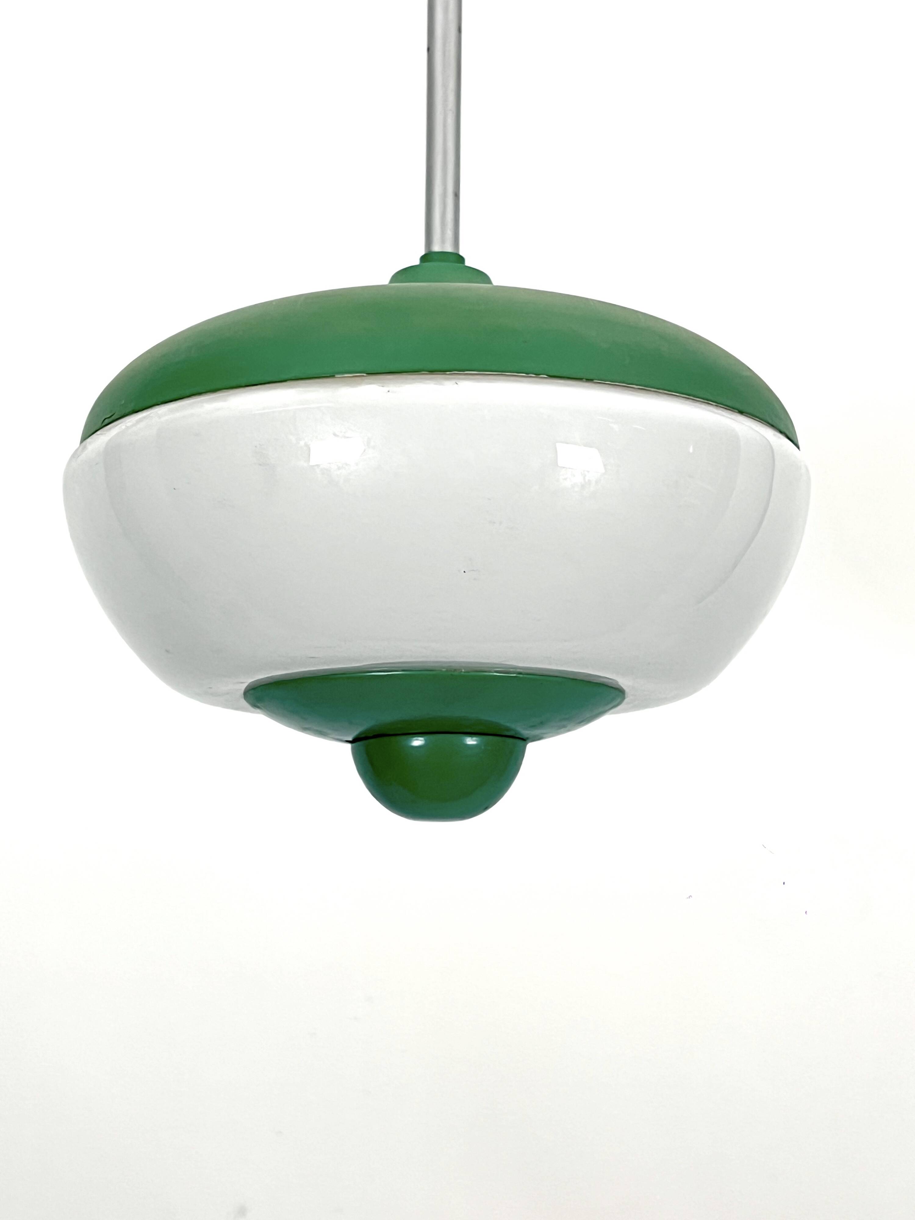 Mid-Century green lacquer and milk glass pendant. Italy 1950s