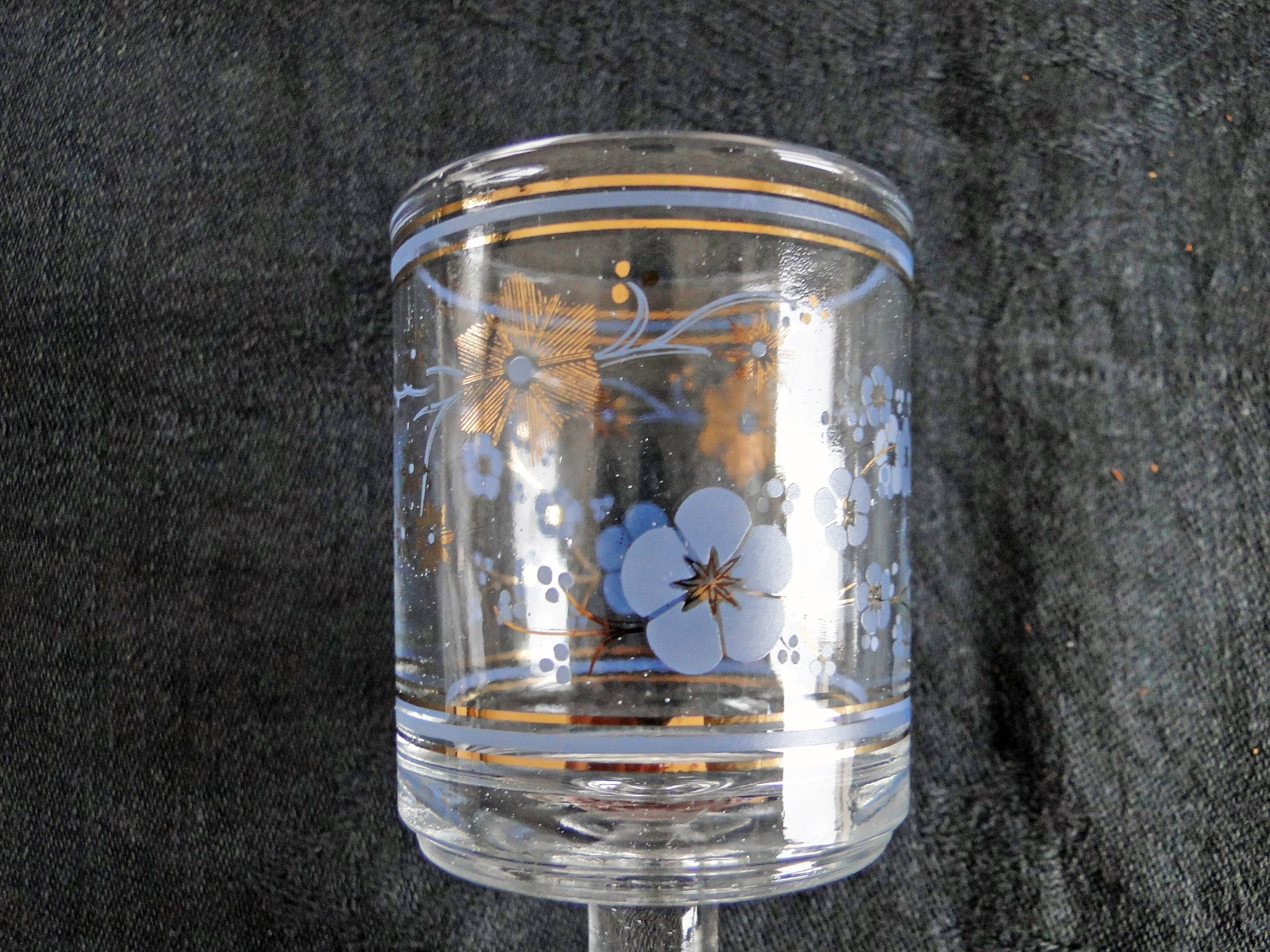 5 old glasses on foot floral decoration blue and gold vintage crystal?