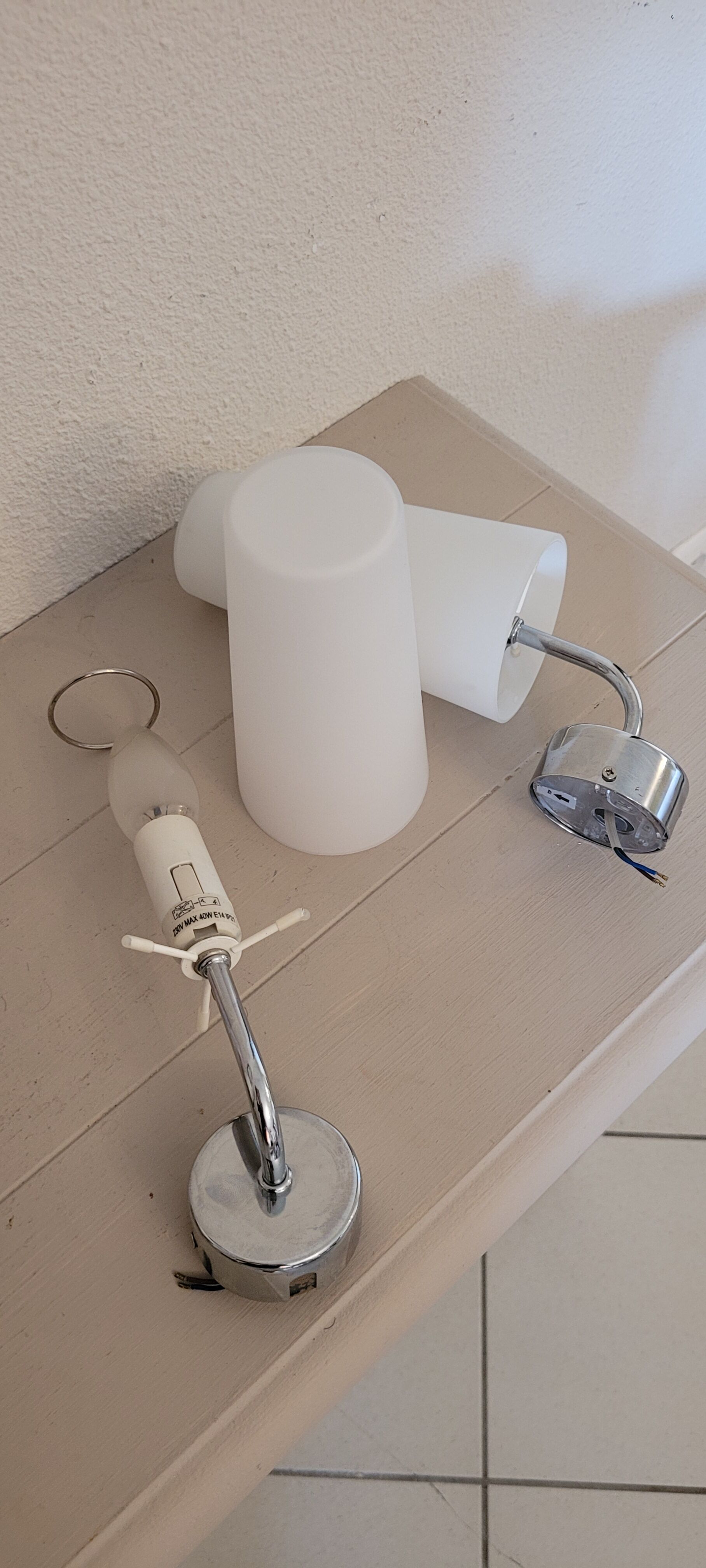 Pair of opaque glass wall lamps