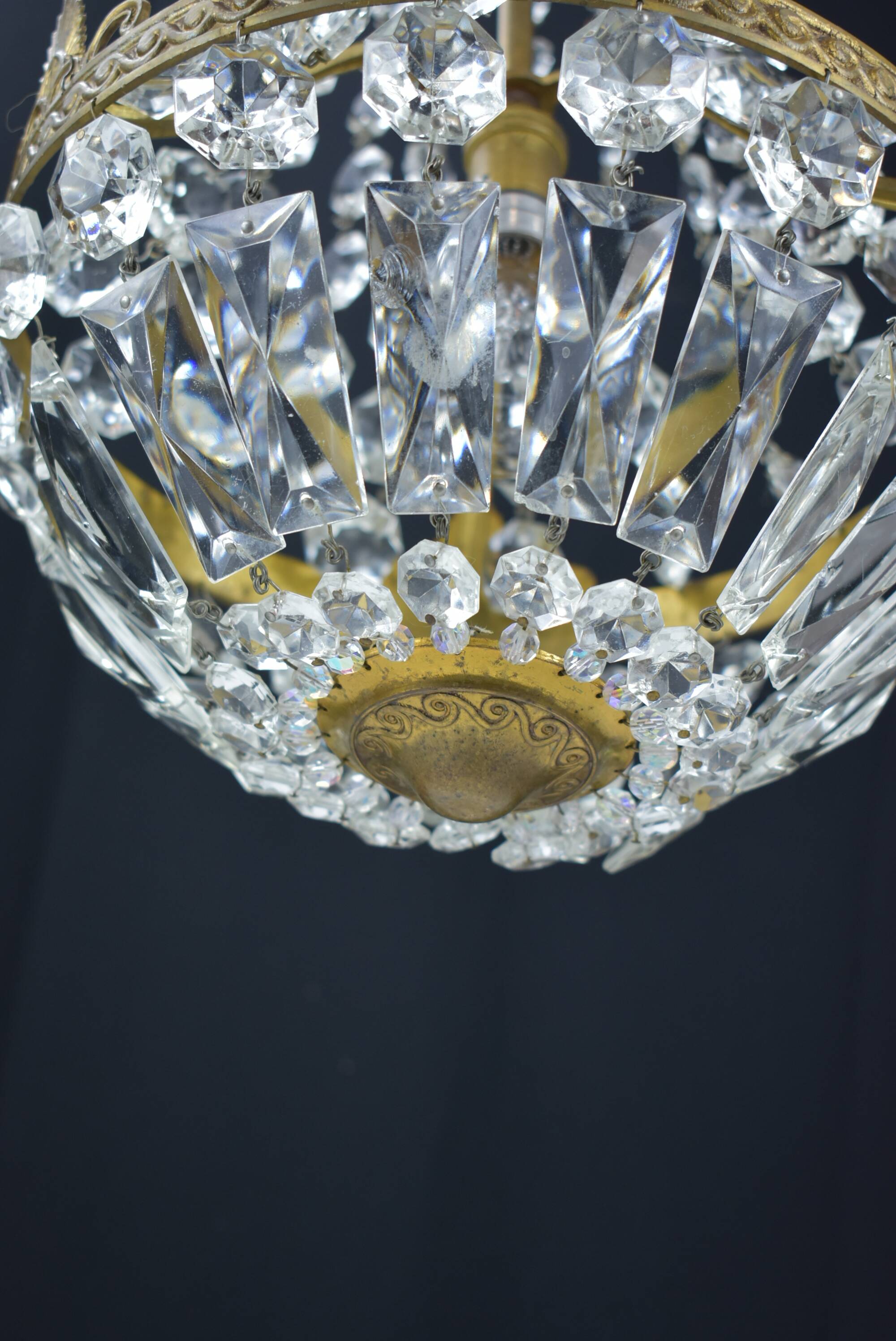 Hot air balloon chandeliers with glass tassels.