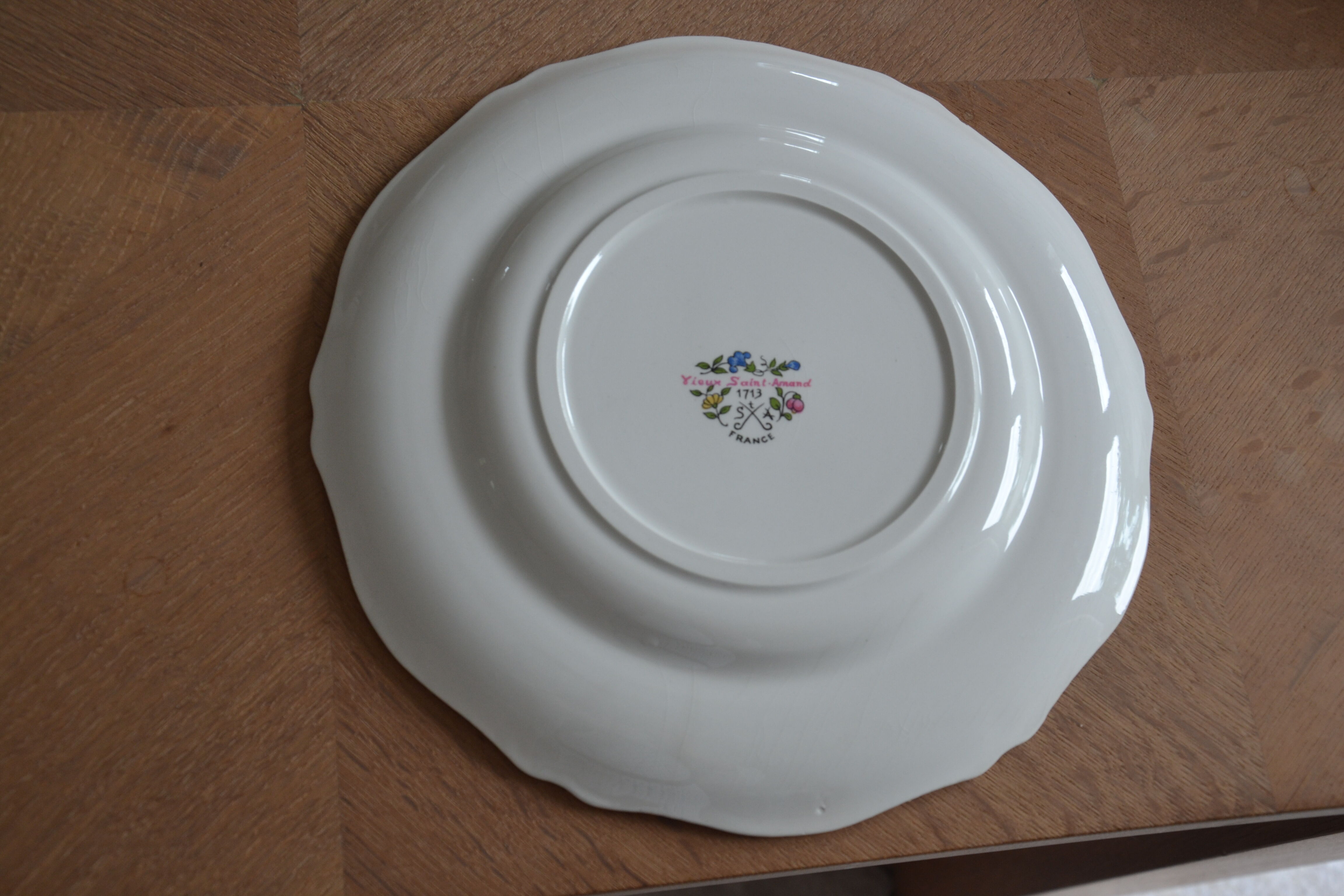 12 old St Amand flat plates 1713