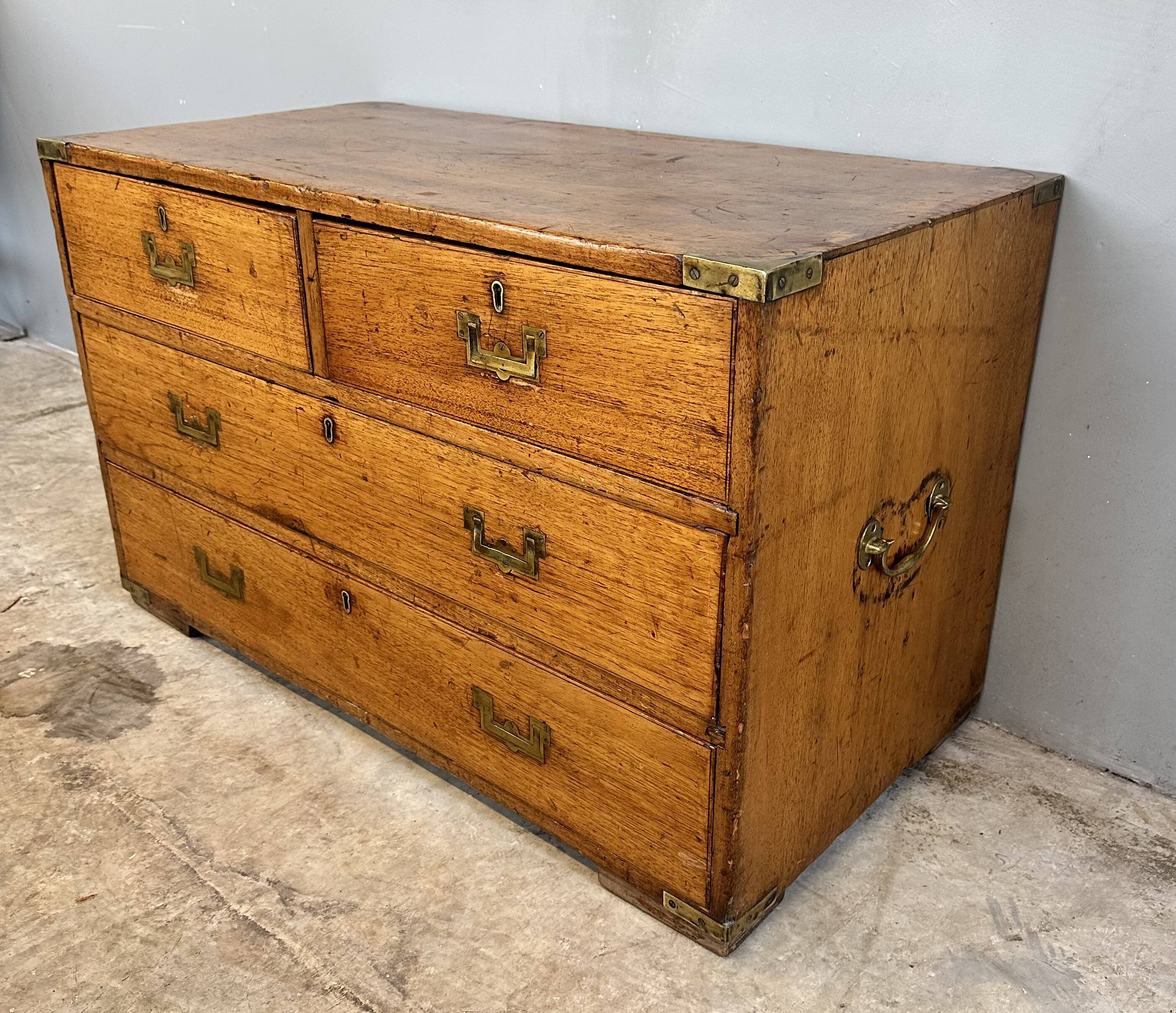 Small marine chest of drawers in wood and brass