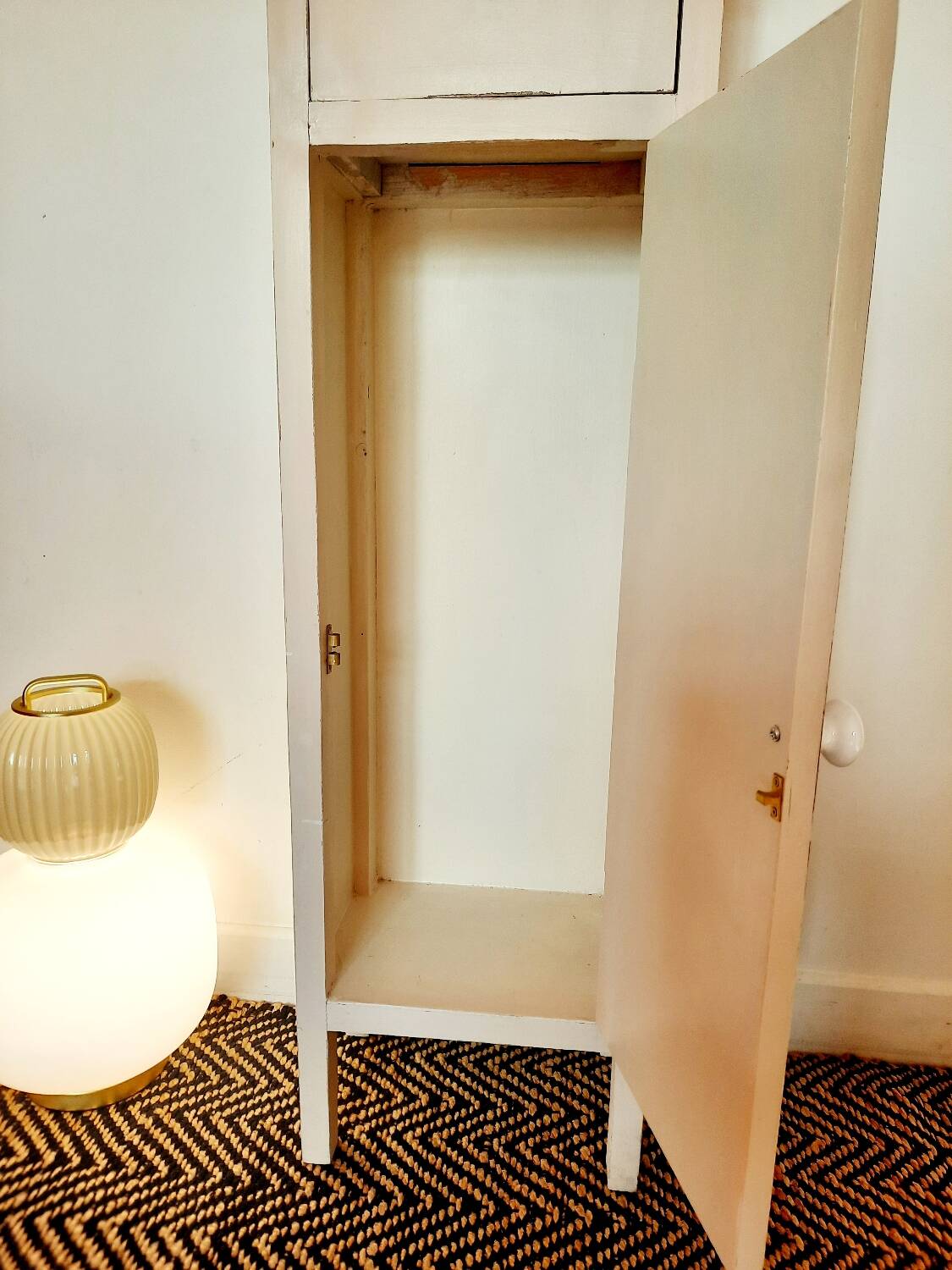 Antique tall cabinet painted white