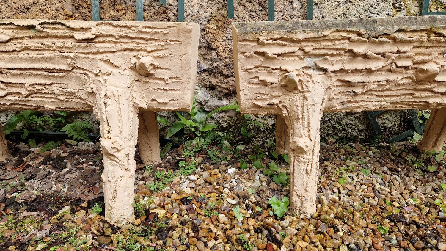 Pair of cement planters in faux wood finish