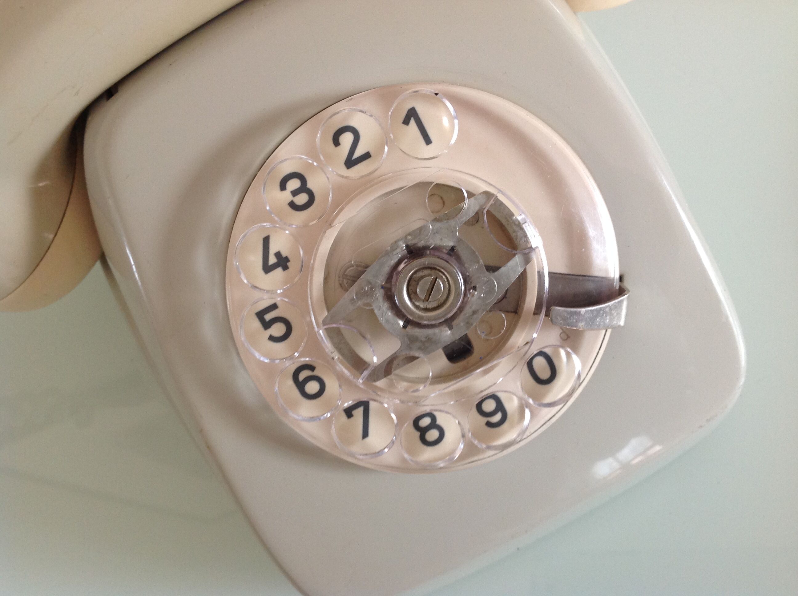 Vintage gray and beige rotary phone