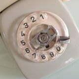 Vintage gray and beige rotary phone