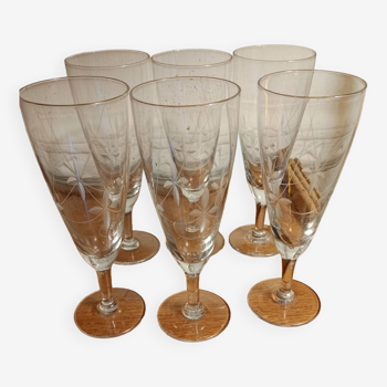 Six engraved crystal champagne flutes