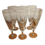Six engraved crystal champagne flutes
