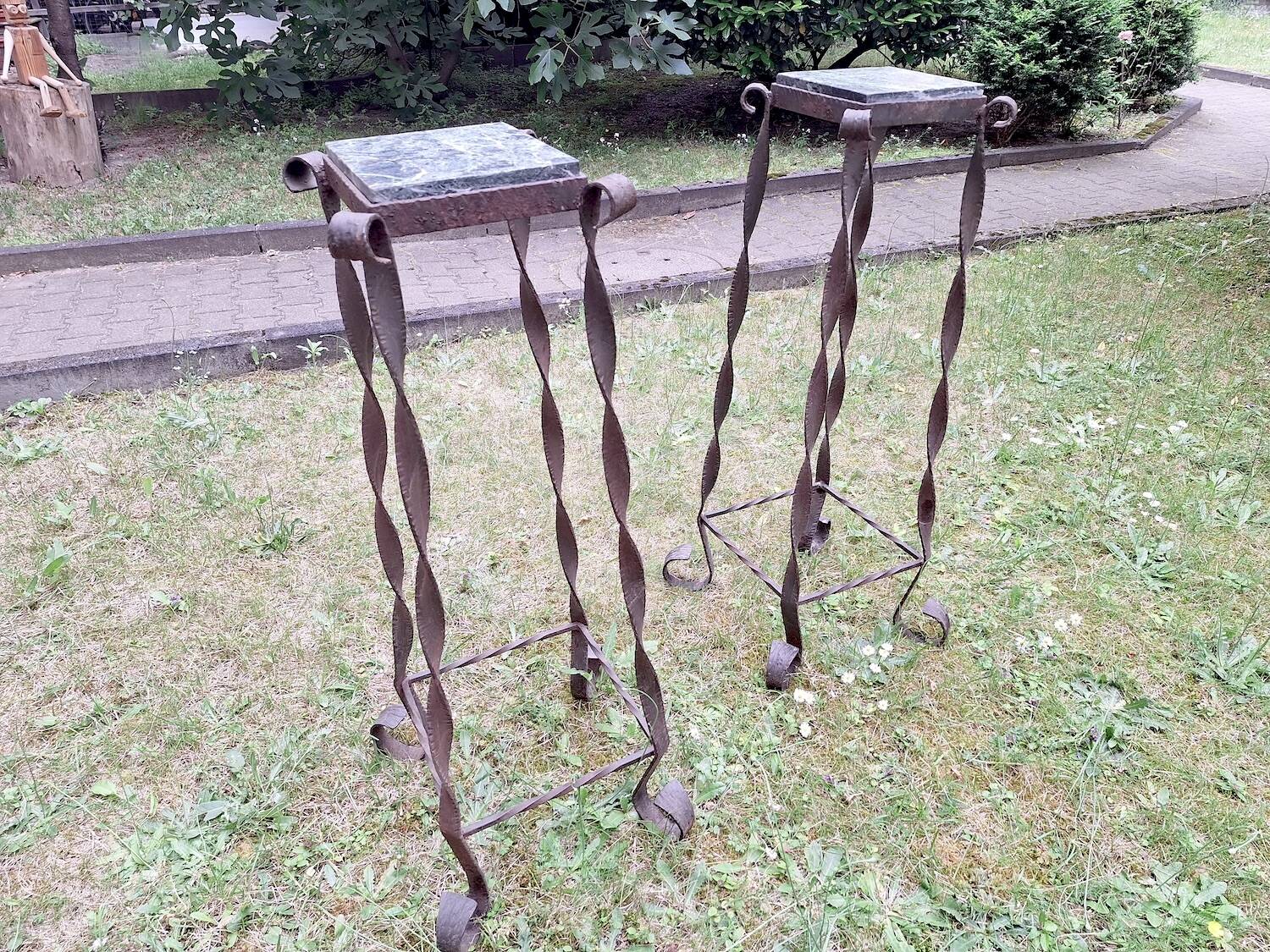Pair of Brutalist patinated iron and veined marble columns, 1960s