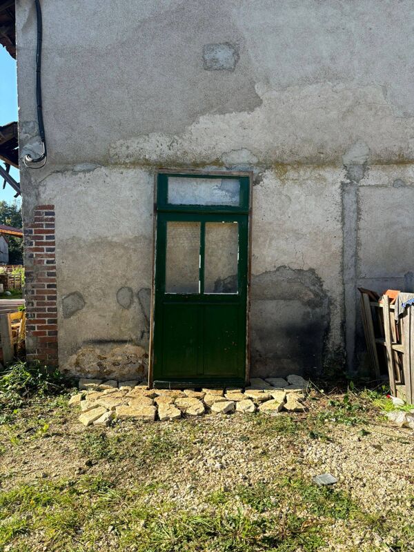 Porte ancienne vitrée avec cadre