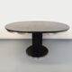 Vintage dining table in melamine with a black wood effect and chrome metal.