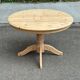 Table de repas ronde extensible en bois massif brut