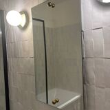 Miroir en applique avec boutons doré