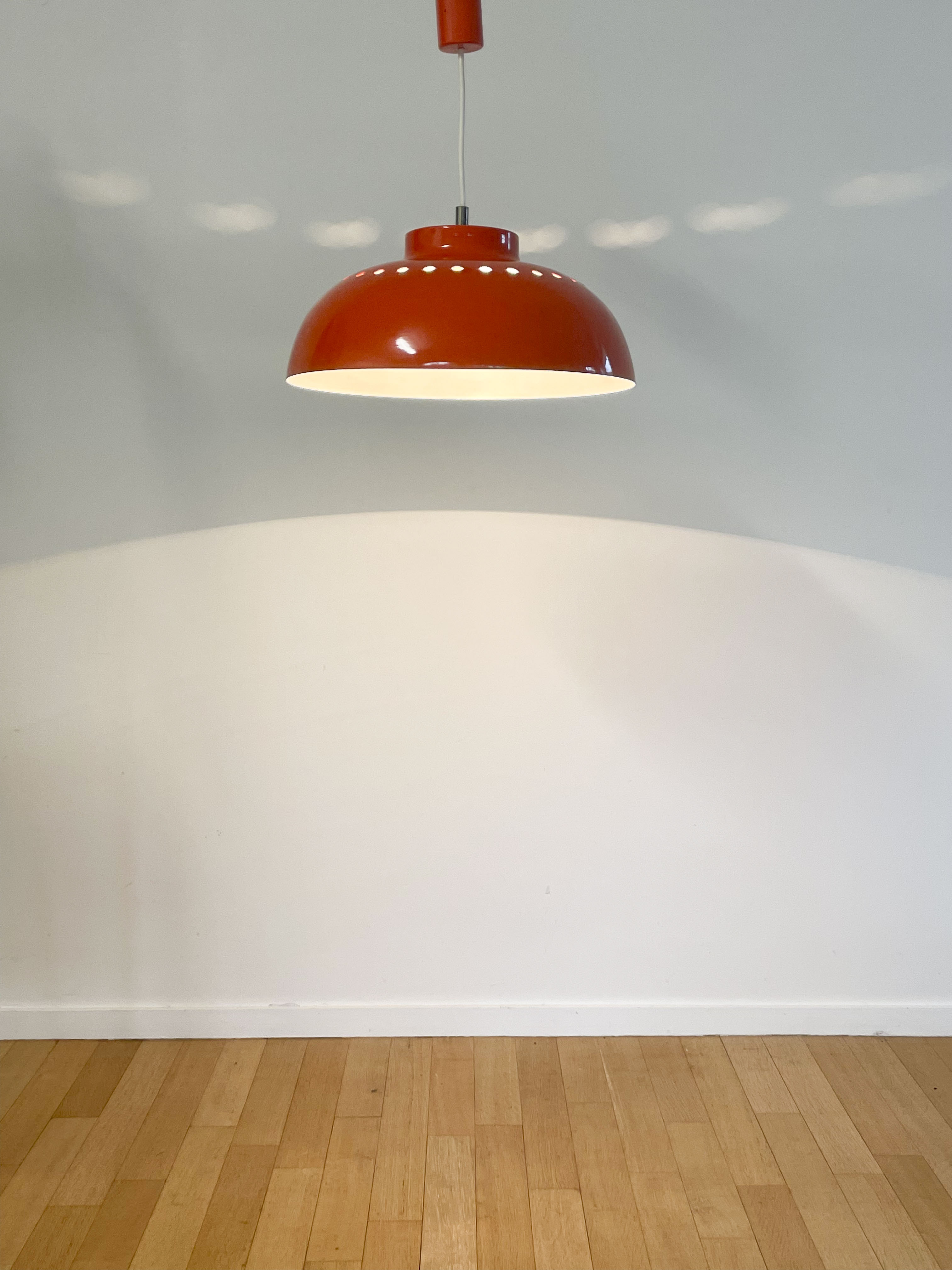 Orange metal suspension, 1970