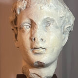 Bust, head of a young man - reproduction from the museum of Sens