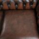 Nice cow leather Chesterfield 2-seater sofa in English style