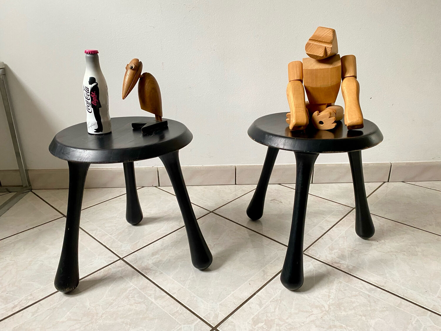 Pair of Ingvar Kamprad design tripod low stools, Habitat edition