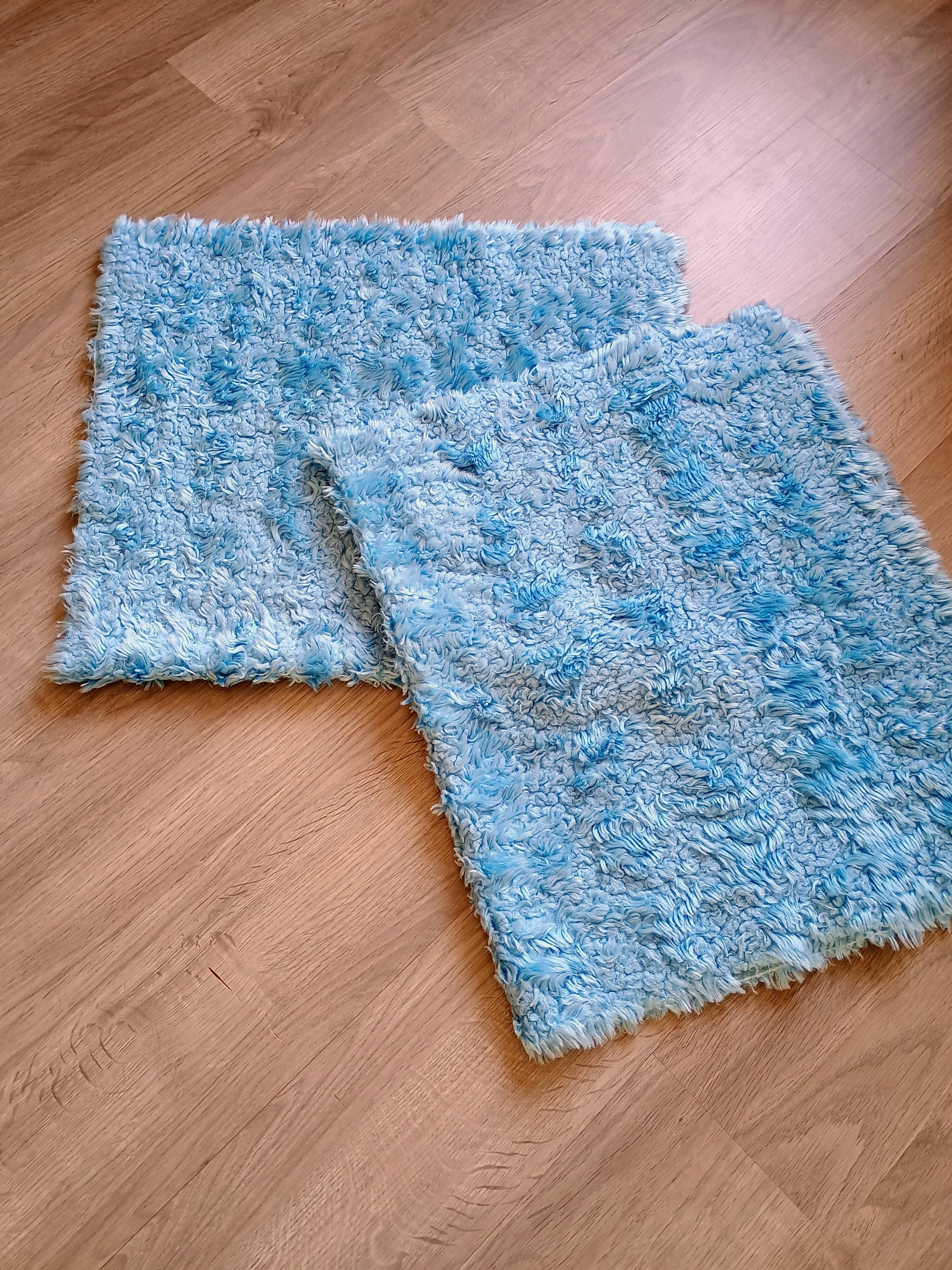 Set of two vintage sky blue rugs from the 70s