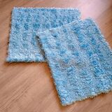 Set of two vintage sky blue rugs from the 70s