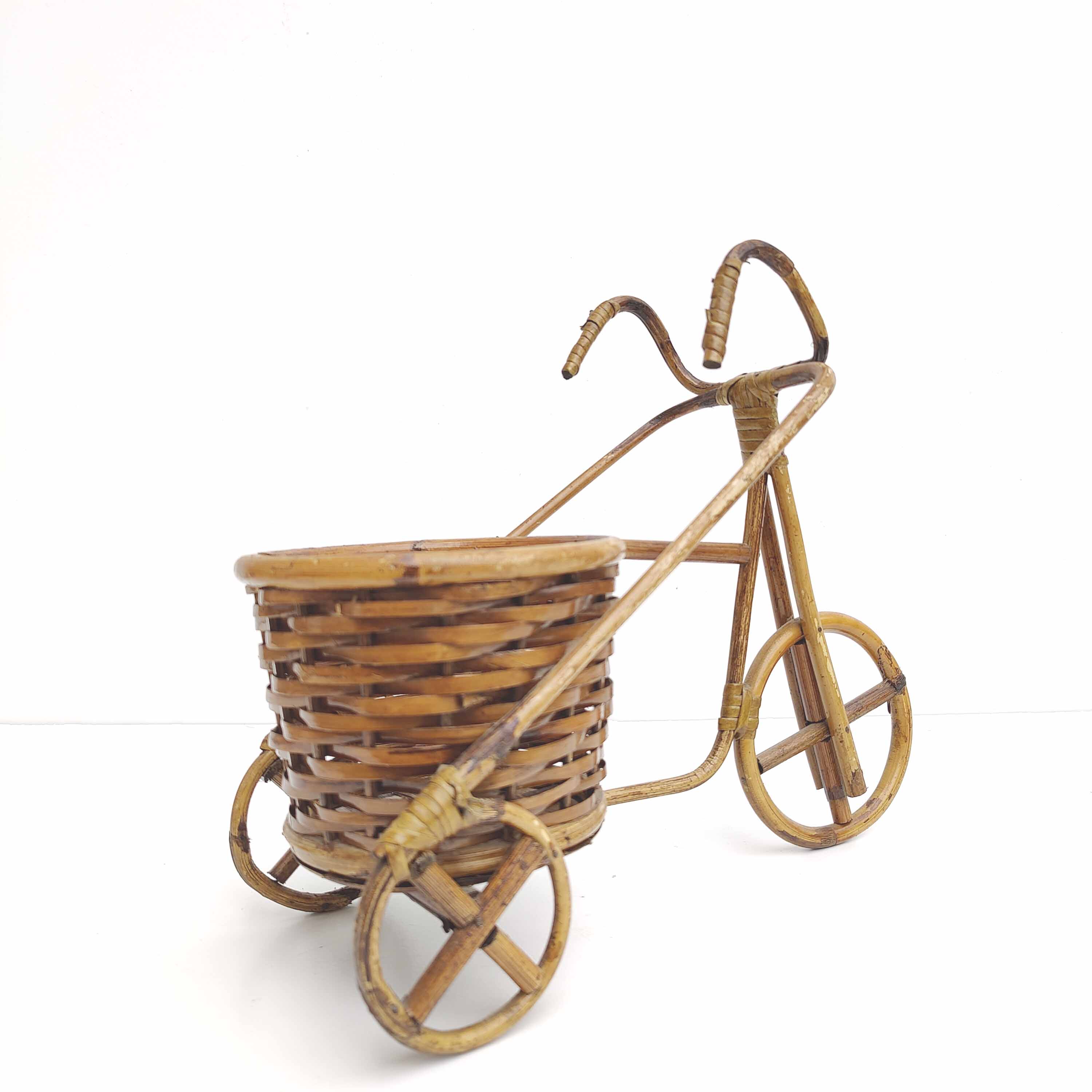 Vintage rattan bicycle plant holder