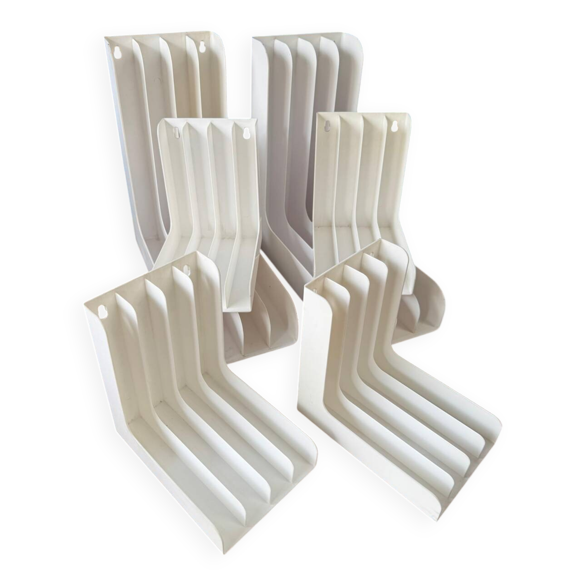Set of 6 boomerang-shaped vinyl record racks/storage units. 1970s/80s.