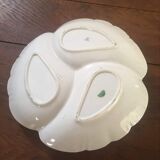 Dish with porcelain compartments.