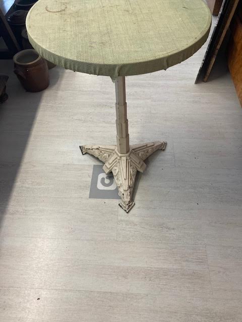 Round table with cast iron stand