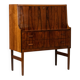 Rosewood chest of drawers with 2 drawers, forming a secretary. 1970s.