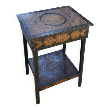 Decorated antique side table with elephant