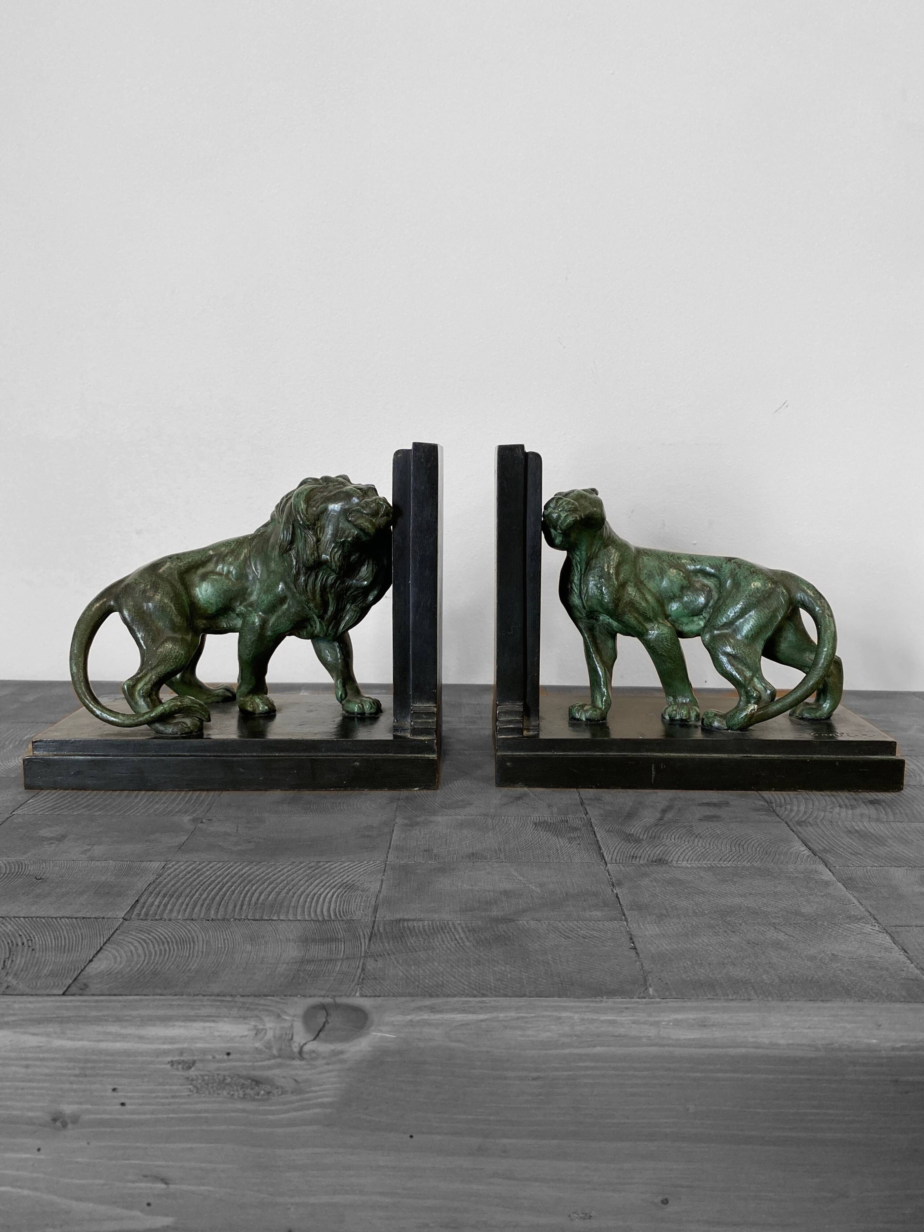 Lion and lioness bookends by Joseph Carlier, 1930