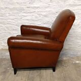 Restored horsehair club chair with curved back