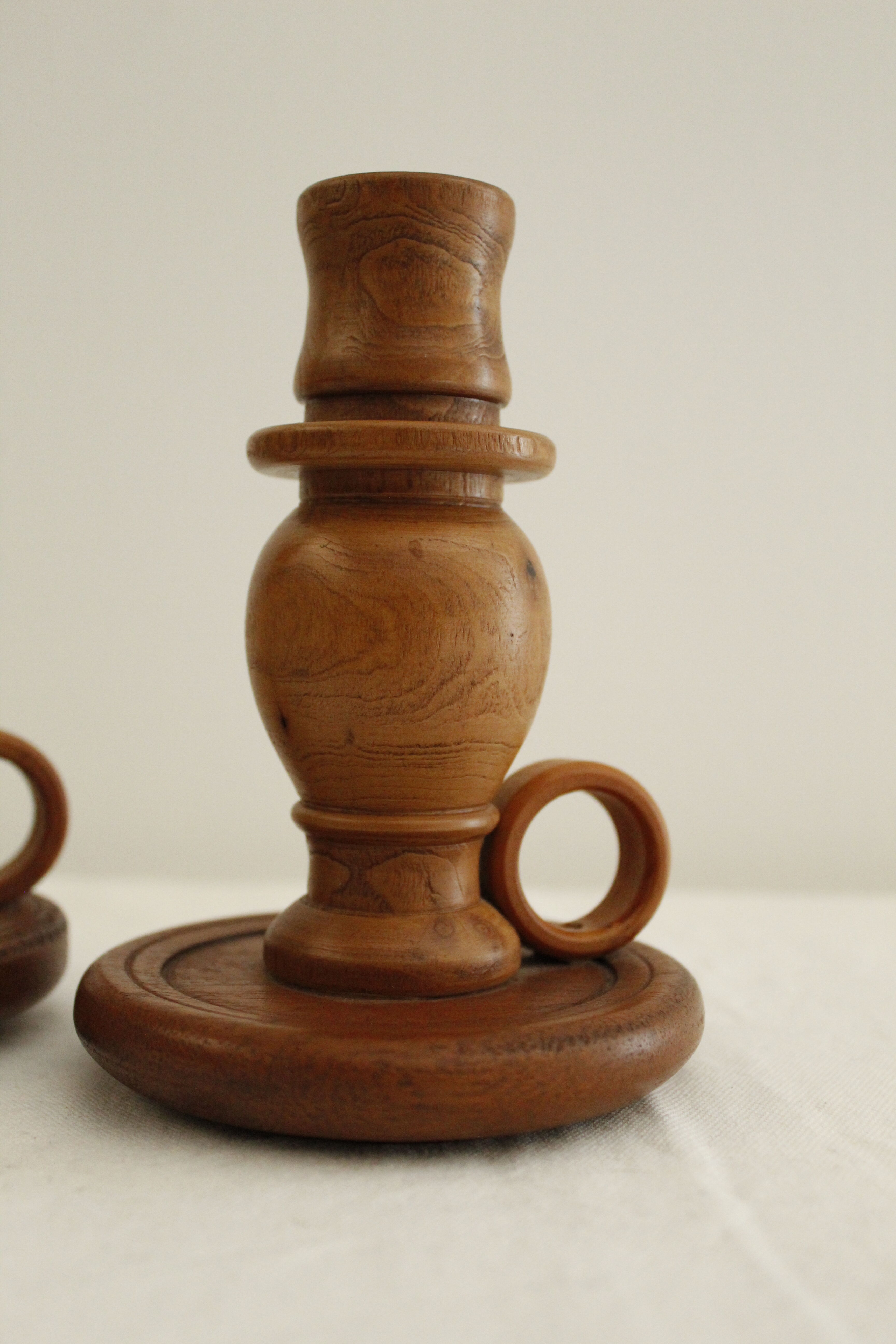 2 wooden candle holders