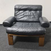 Vintage black leather patchwork and oak lounge chair